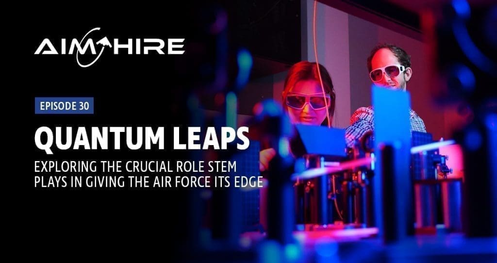 Aim Hire Episode 30: Quantum Leaps, Exploring the Crucial Role Stem Plays in Giving the Air Force its Edge. A woman and a man wearing safety goggles look at a model.
